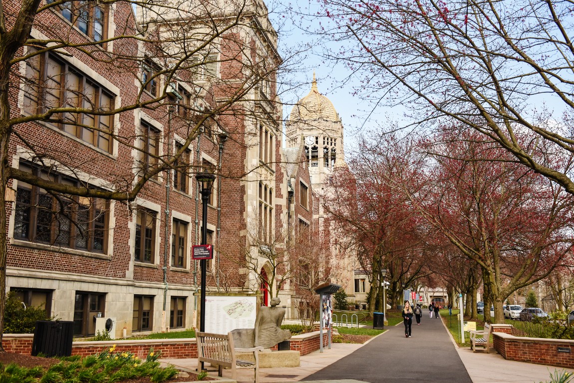 Students walk Muhlenberg College's academic row in the spring.